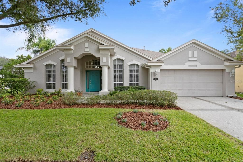 1728 TANGLEDVINE DRIVE WESLEY CHAPEL, FL 33543
