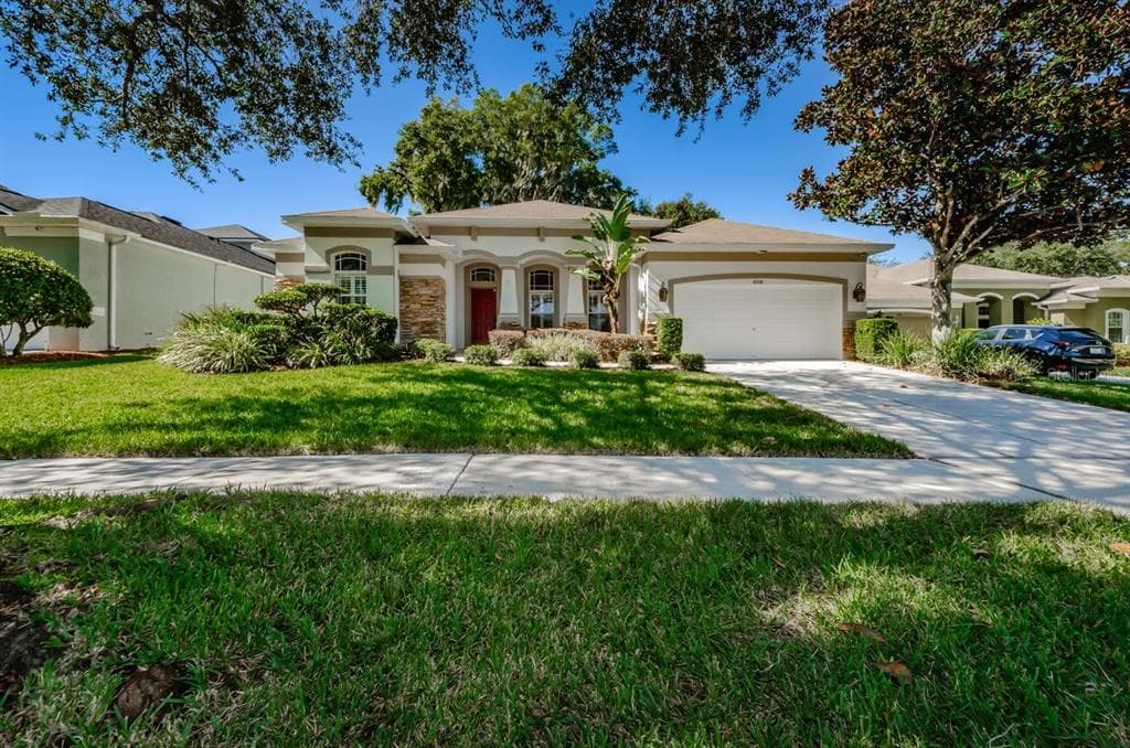 606 HERITAGE PARK COURT VALRICO, FL 33594
