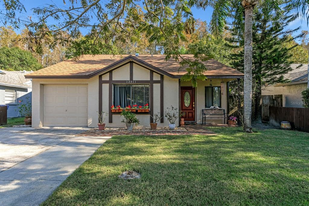 12311 HIDDEN BROOK DRIVE TAMPA, FL 33624