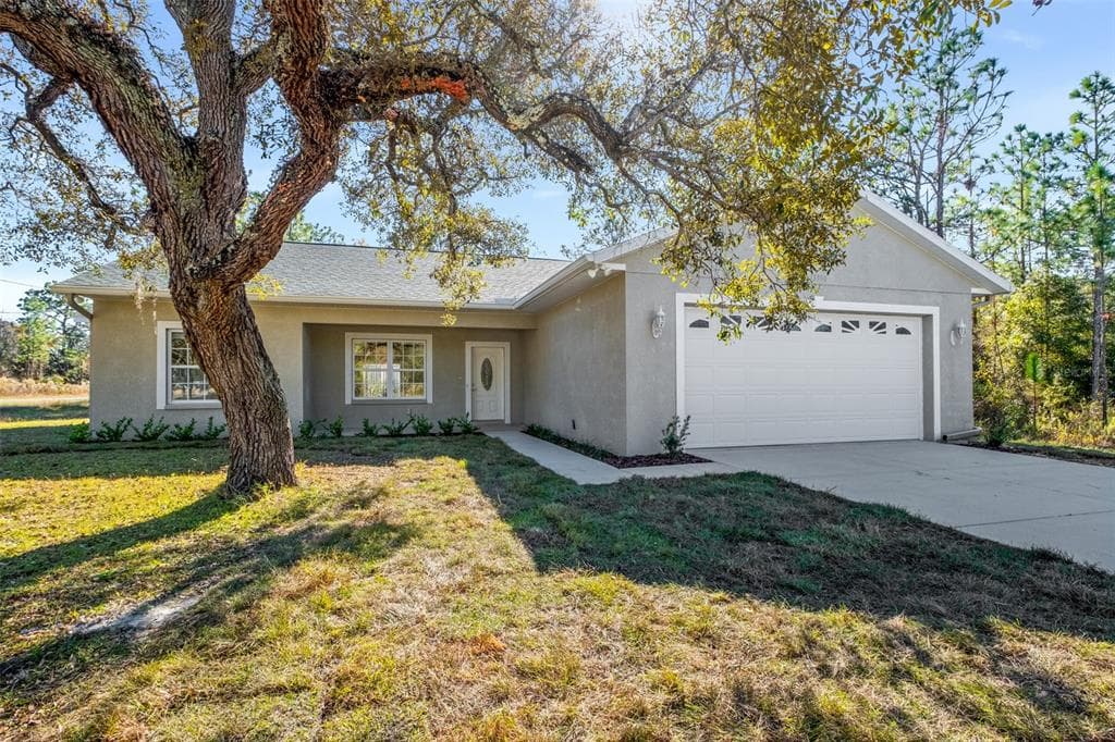 13390 RAIN OWL AVENUE BROOKSVILLE, FL 34614