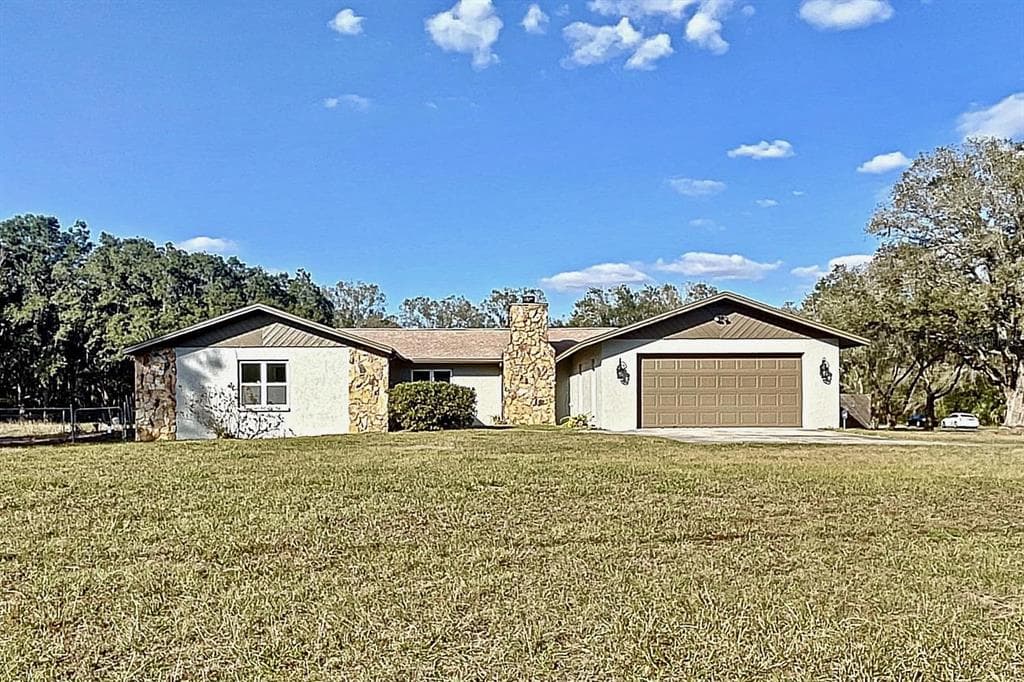 25143 OAKS BOULEVARD LAND O LAKES, FL 34639
