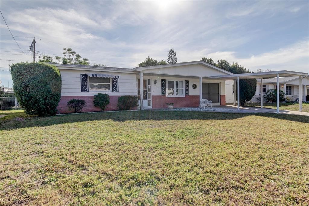 4640 TROPICAL LANE HOLIDAY, FL 34690