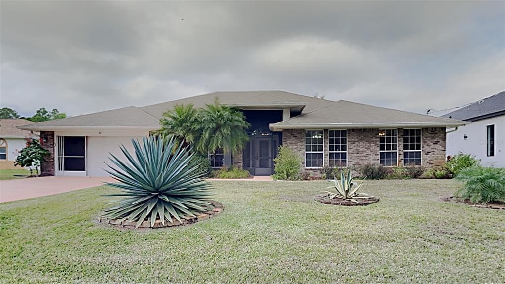 27 BURNING BUSH DRIVE PALM COAST, FL 32137