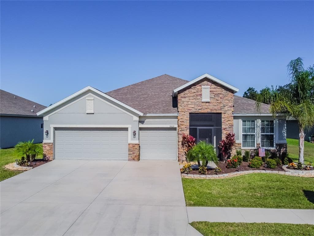 34031 LAUGHING OAK DRIVE WESLEY CHAPEL, FL 33545
