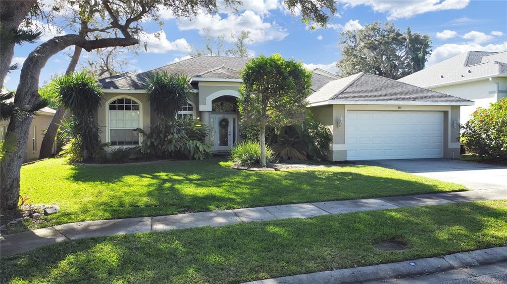 406 GRAY OAK DRIVE TARPON SPRINGS, FL 34689