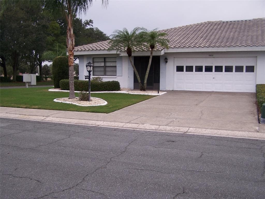 1602 WOODMAR DRIVE SUN CITY CENTER, FL 33573