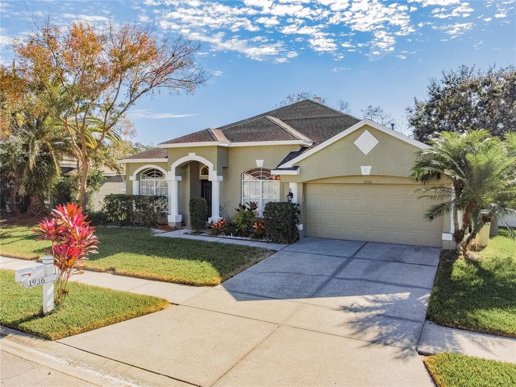 1936 TANGLEDVINE DRIVE WESLEY CHAPEL, FL 33543
