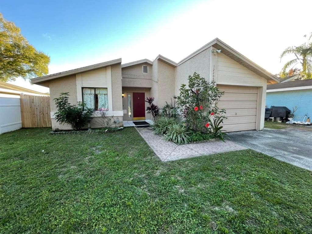 12209 HIDDEN BROOK DRIVE TAMPA, FL 33624