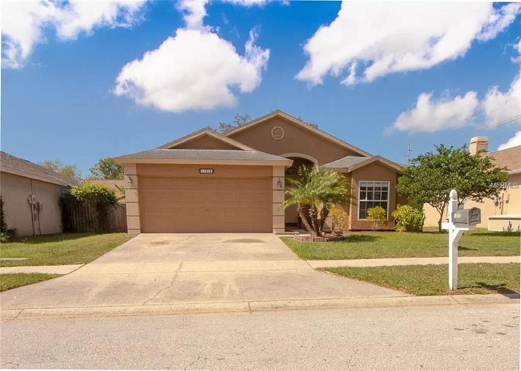 11212 INDIAN OAKS DRIVE TAMPA, FL 33625
