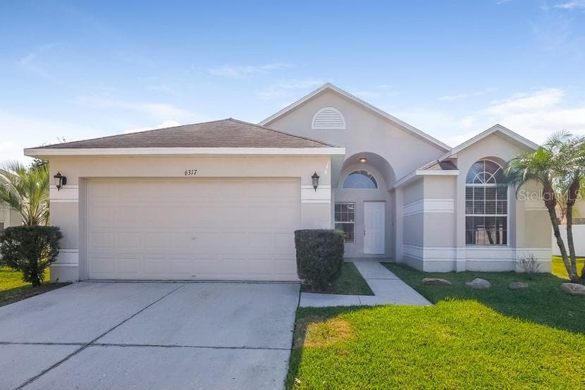 6317 OPEN PASTURE COURT WESLEY CHAPEL, FL 33545