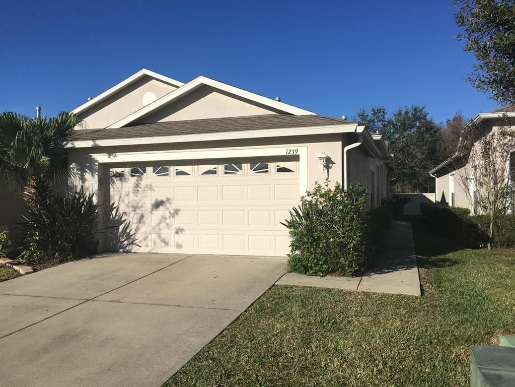 1239 AMBRIDGE DRIVE WESLEY CHAPEL, FL 33543