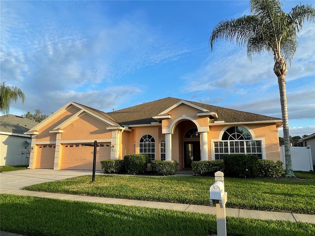1406 DEERBOURNE DRIVE WESLEY CHAPEL, FL 33543