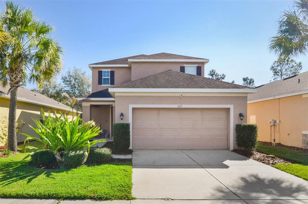 7711 TUSCANY WOODS DRIVE