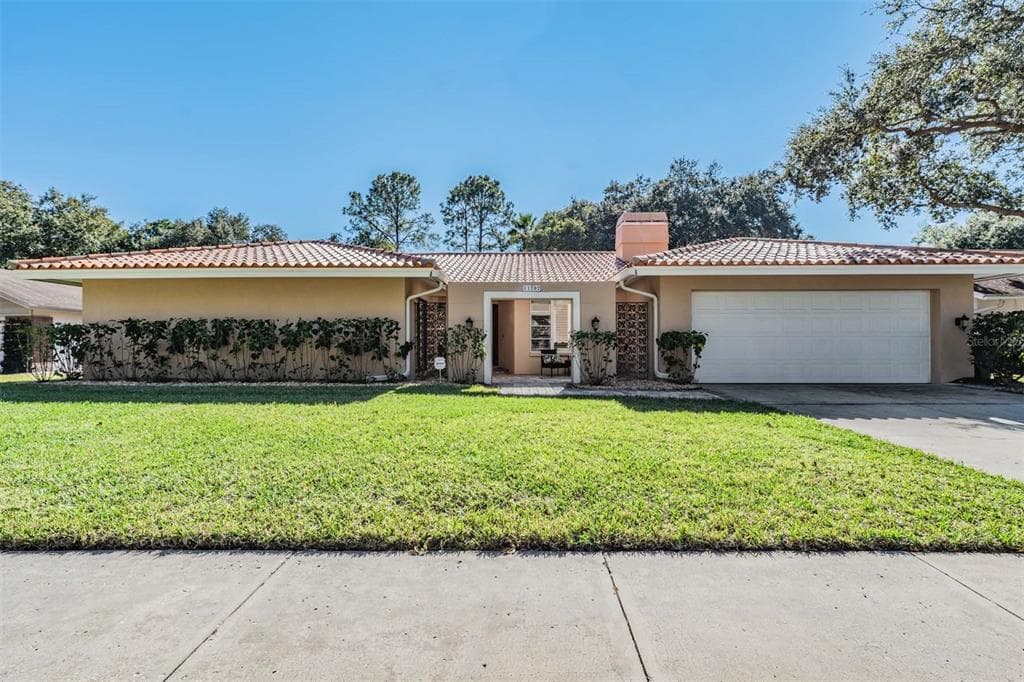 11707 ROLLING OAKS LANE TAMPA, FL 33618
