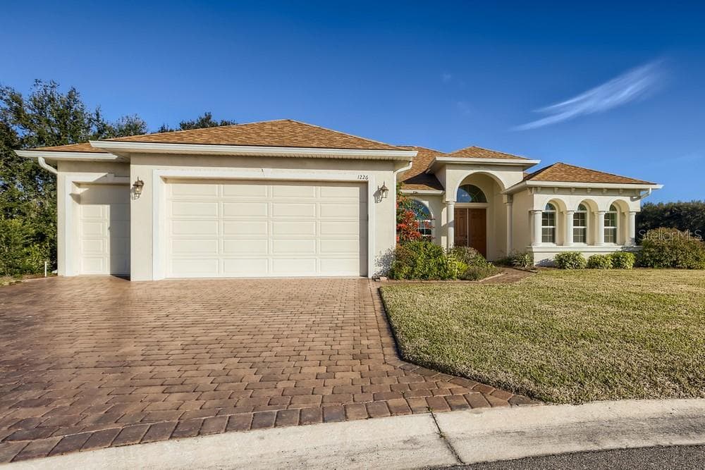 1226 SAWGRASS DRIVE WINTER HAVEN, FL 33884