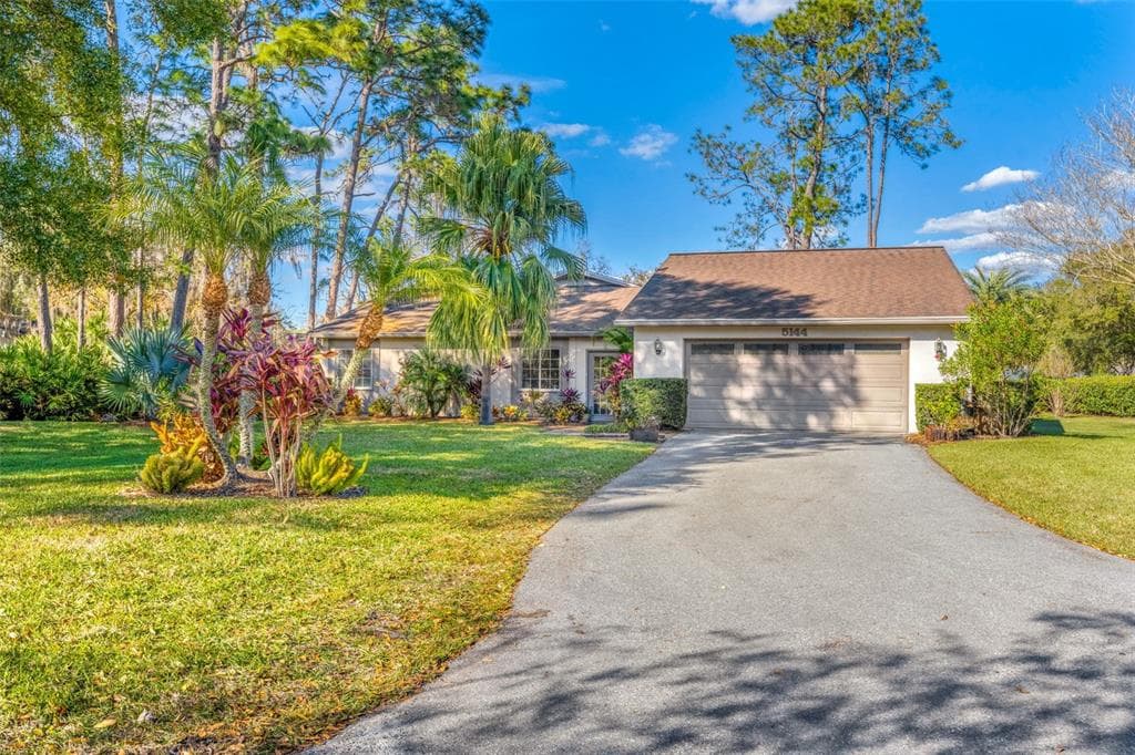 5144 PINE TREE LANE WESLEY CHAPEL, FL 33543