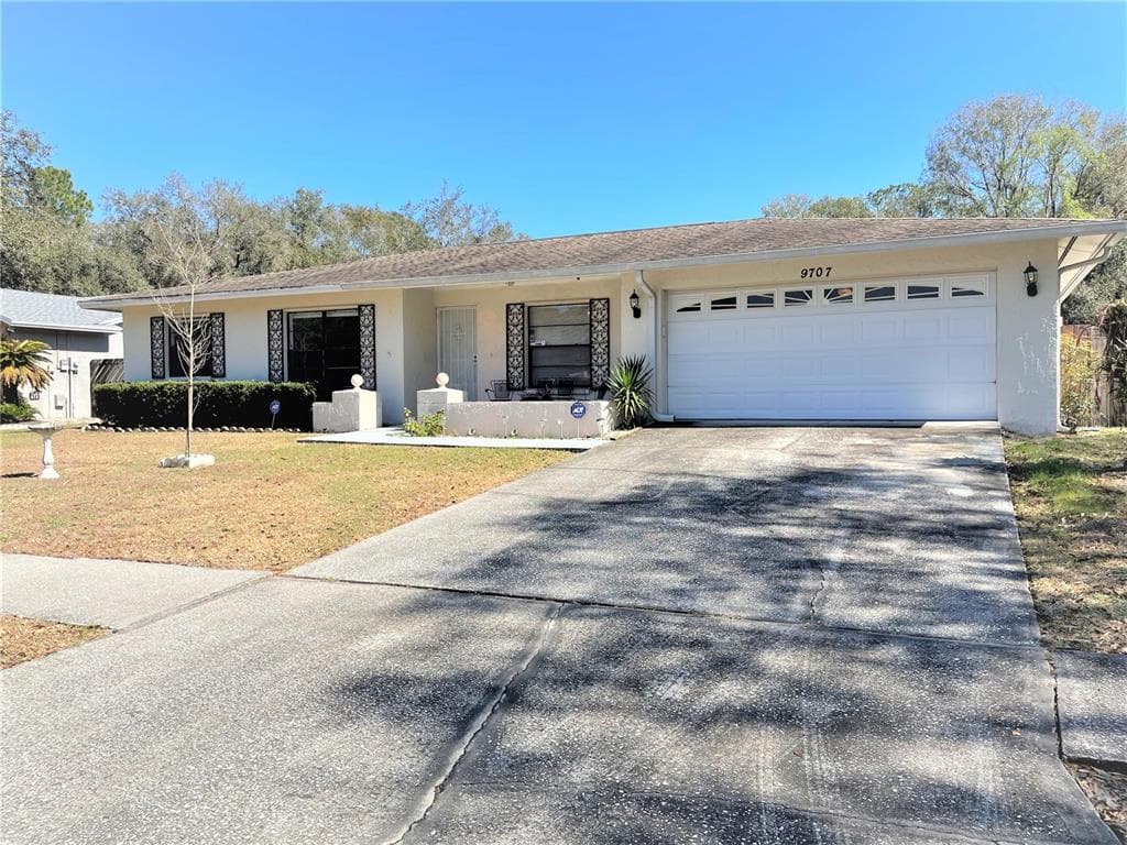 9707 WOODLAND RIDGE DRIVE TEMPLE TERRACE, FL 33637