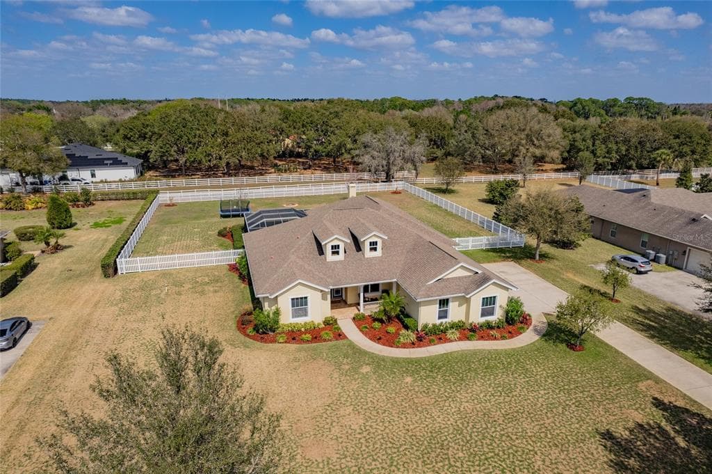7709 KENIA MEADOWS LANE