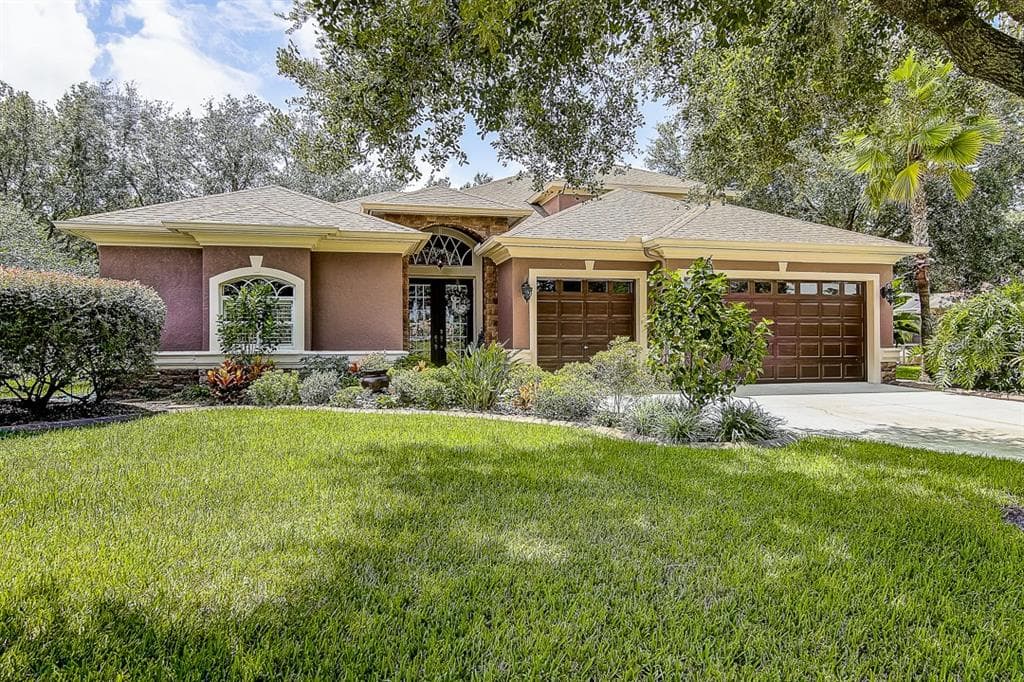 1304 OXBRIDGE DRIVE LUTZ, FL 33549