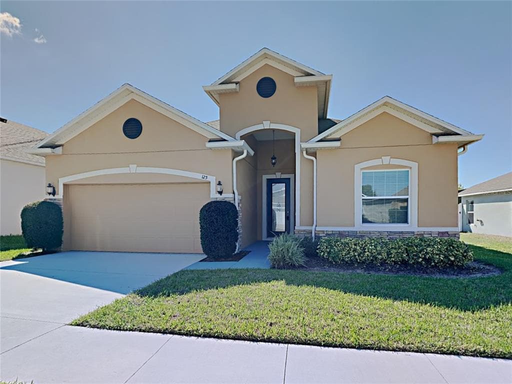 125 FLATWOODS LOOP DAVENPORT, FL 33837