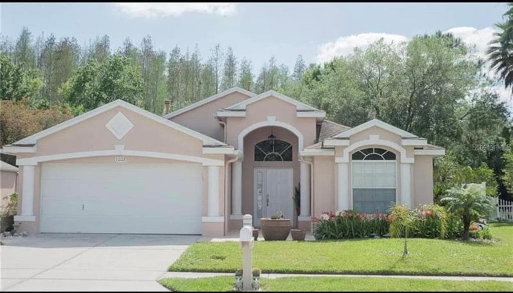 1223 TIMBER TRACE DRIVE WESLEY CHAPEL, FL 33543