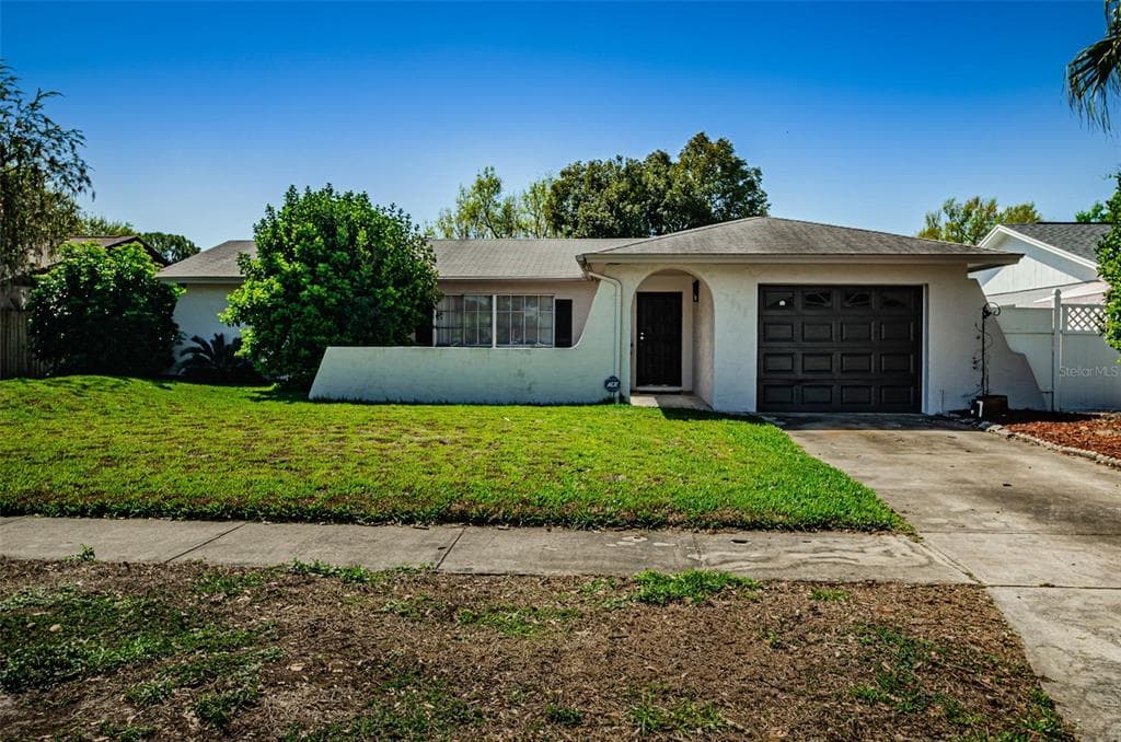 5016 HEADLAND HILLS AVENUE TAMPA, FL 33625