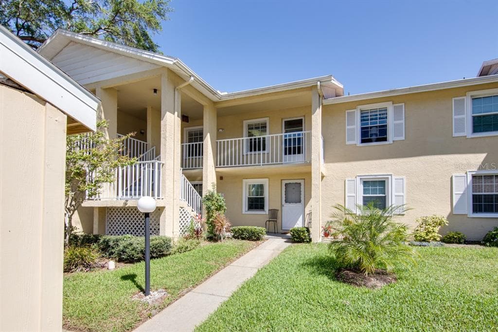 1408 MILLSTREAM LANE UNIT 202 DUNEDIN, FL 34698