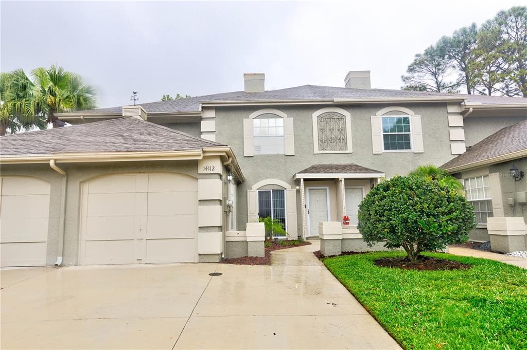 14112 BEAUVILLE COURT TAMPA, FL 33624