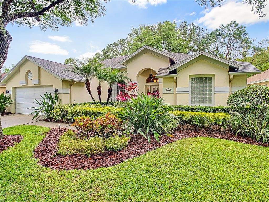 9464 HUNTERS POND DRIVE TAMPA, FL 33647
