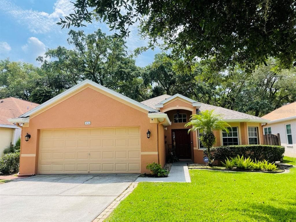 4718 WHISPERING WIND AVENUE TAMPA, FL 33614