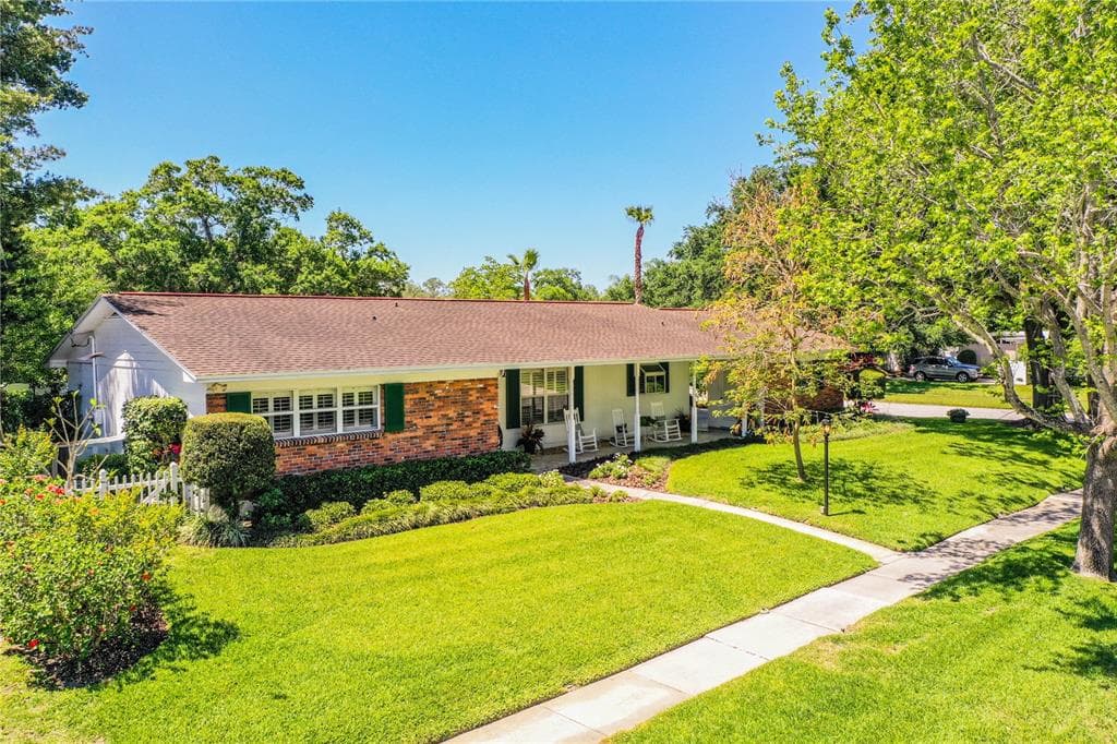 11006 CARROLLWOOD DRIVE