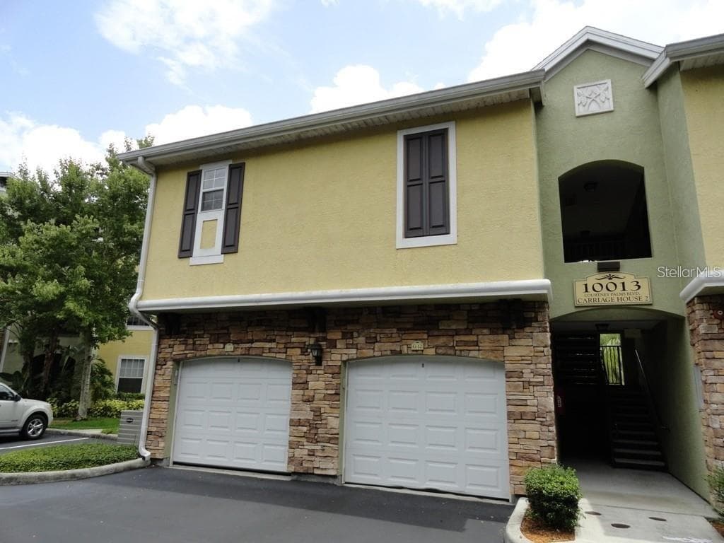 10013 COURTNEY PALMS BOULEVARD UNIT 202 TAMPA, FL 33619