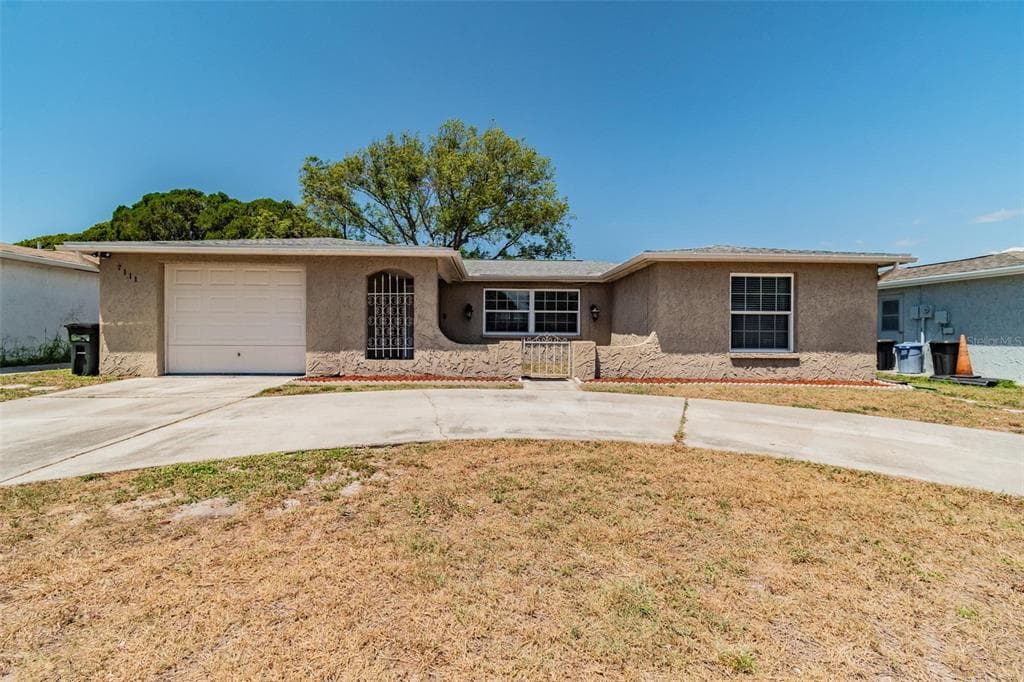 7111 KING ARTHUR DRIVE PORT RICHEY, FL 34668