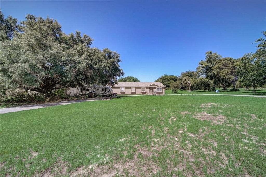 9308 ORANGE BLOSSOM ROAD HOWEY IN THE HILLS, FL 34737