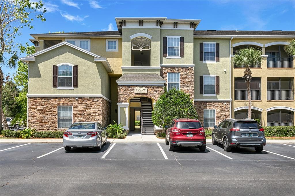 10205 COURTNEY PALMS BOULEVARD UNIT 104 TAMPA, FL 33619