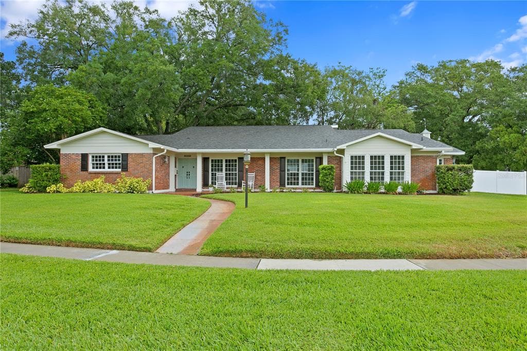 11212 CARROLLWOOD DRIVE TAMPA, FL 33618