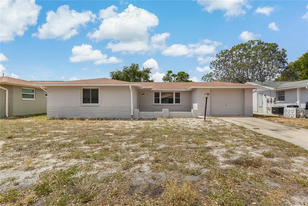 7810 IRONBARK DRIVE PORT RICHEY, FL 34668