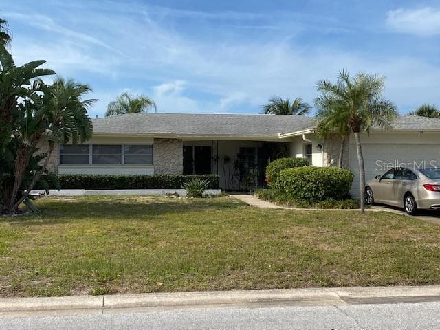 228 HOWARD DRIVE BELLEAIR BEACH, FL 33786