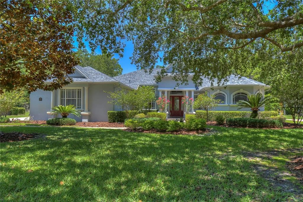 1446 KENSINGTON WOODS DRIVE LUTZ, FL 33549