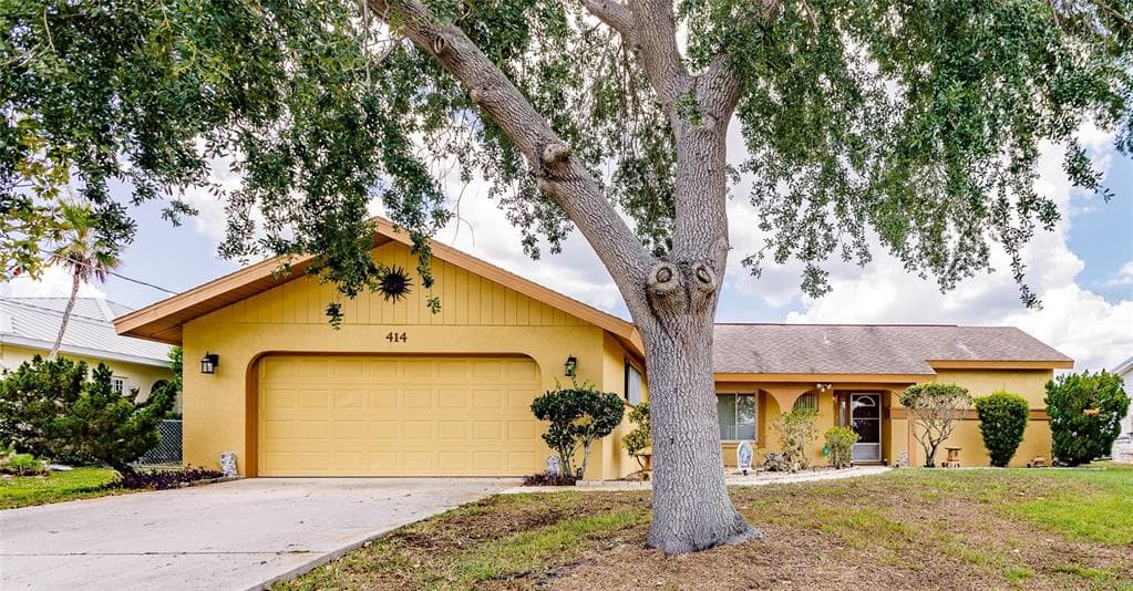 414 SPRING LAKE BOULEVARD NW PORT CHARLOTTE, FL 33952