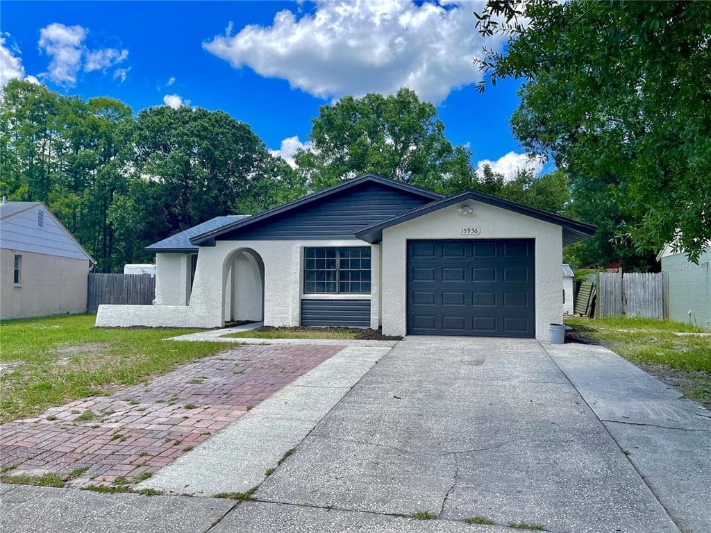 15936 WINDING DRIVE TAMPA, FL 33624