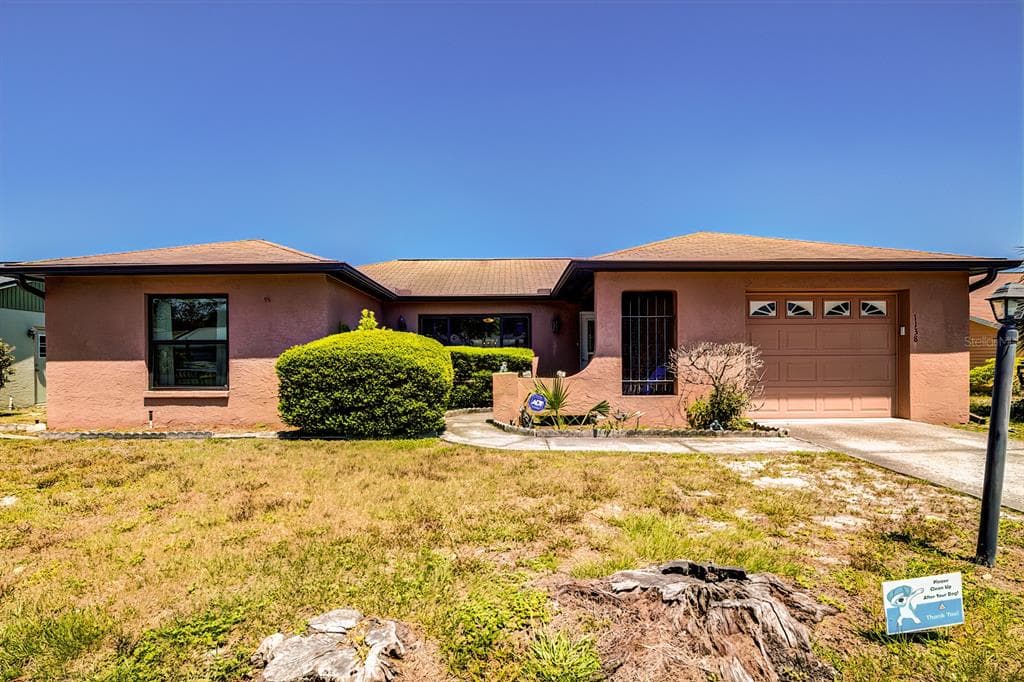 1138 JAMBALANA DRIVE HOLIDAY, FL 34691