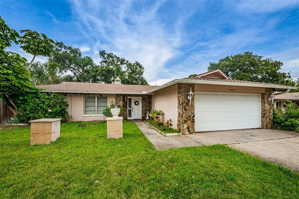 1412 OLEANDER DRIVE TARPON SPRINGS, FL 34689