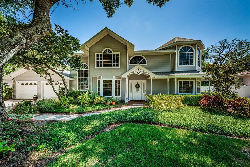 979 WEATHERSFIELD DRIVE DUNEDIN, FL 34698