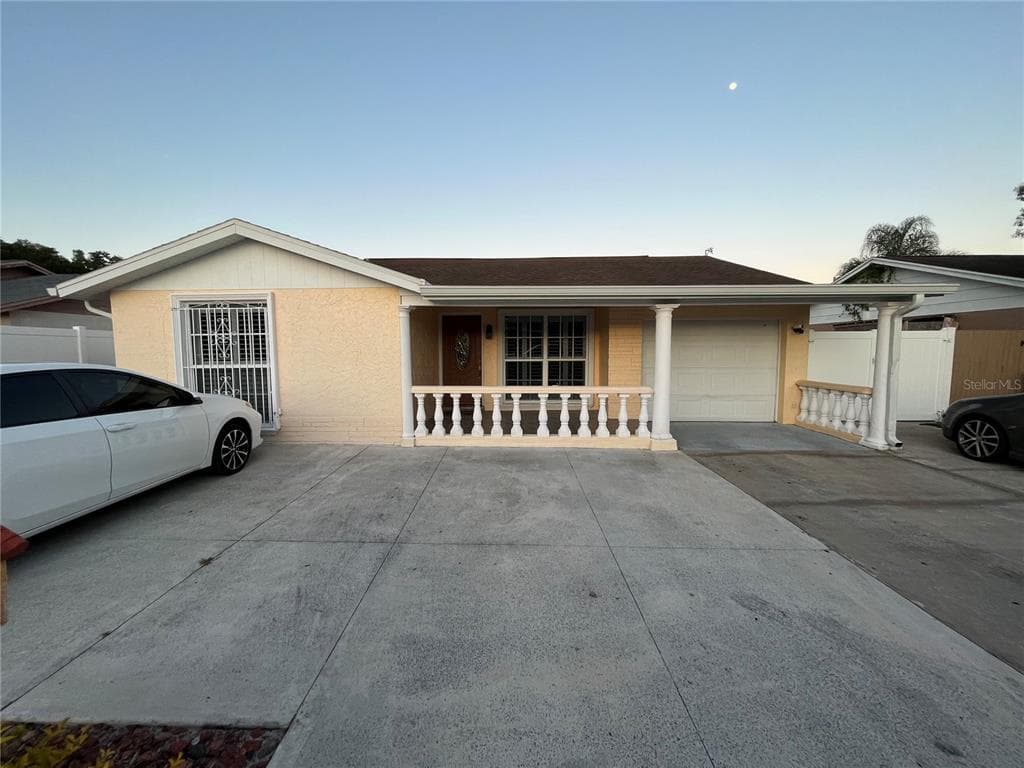 8913 PEPPERMILL COURT TAMPA, FL 33634