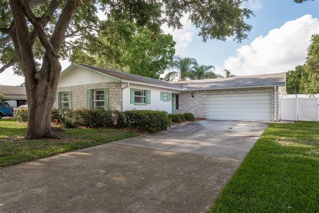 1869 TEAKWOOD LANE DUNEDIN, FL 34698