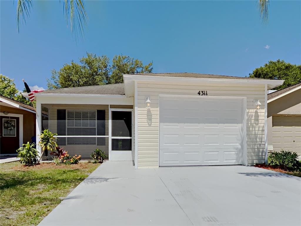 4311 LONGSHORE DRIVE LAND O LAKES, FL 34639