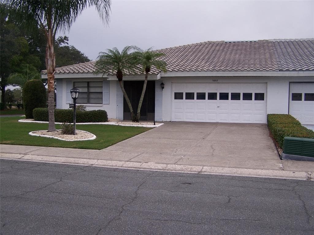 1602 WOODMAR DRIVE SUN CITY CENTER, FL 33573