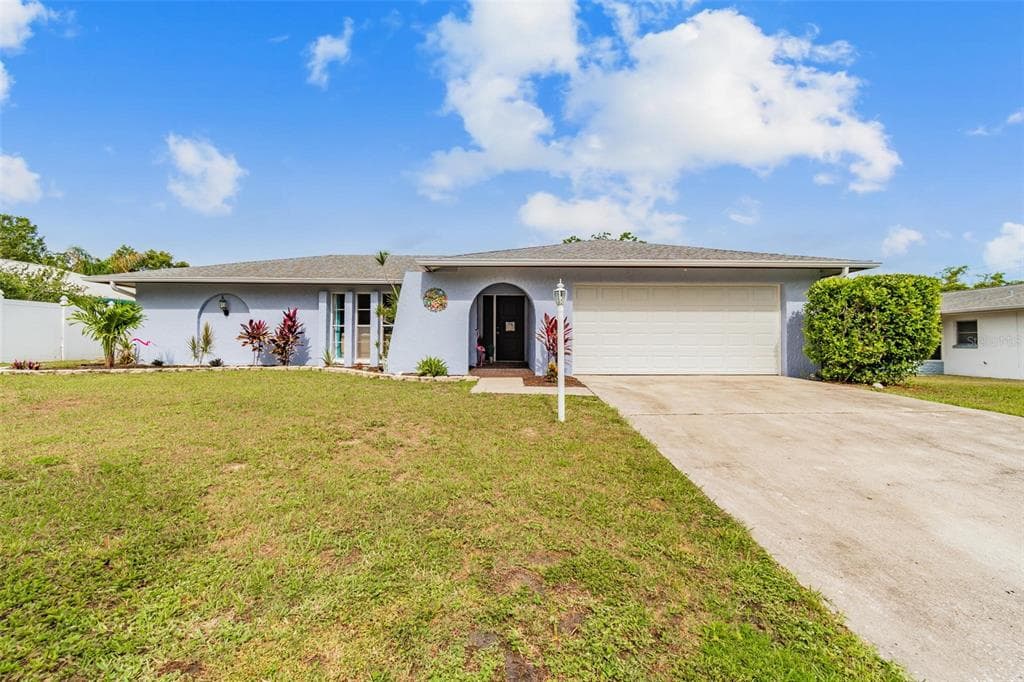 1980 CANADIANA COURT DUNEDIN, FL 34698