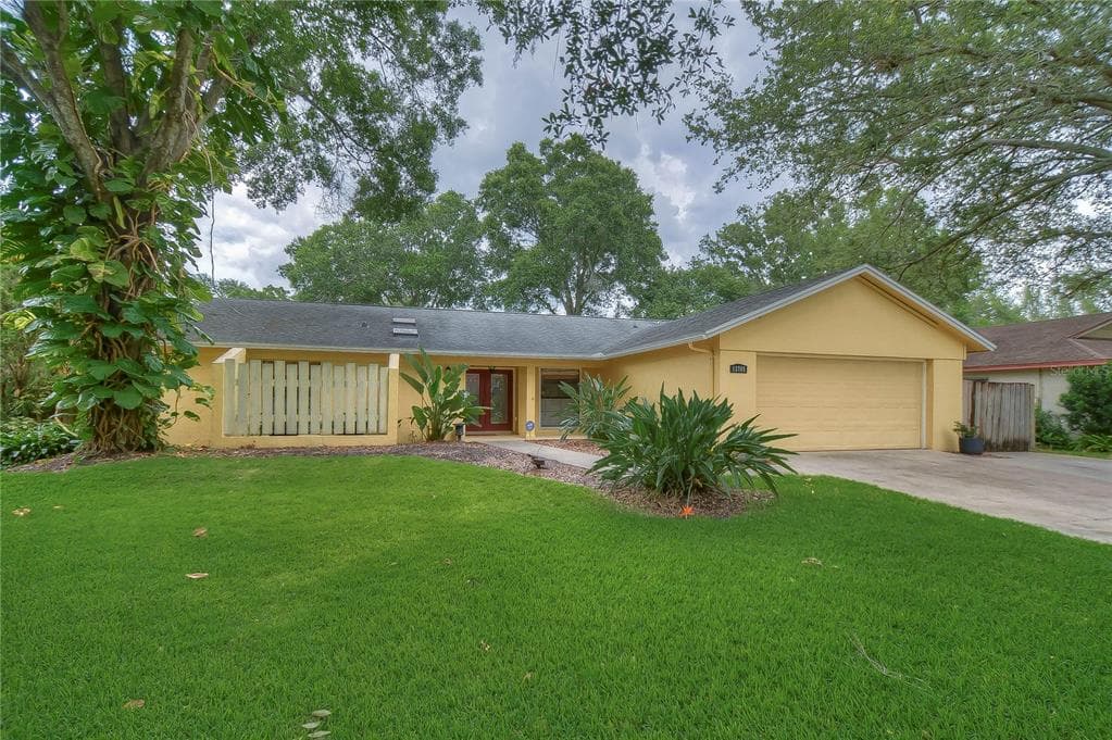 13705 WILKES DRIVE TAMPA, FL 33618